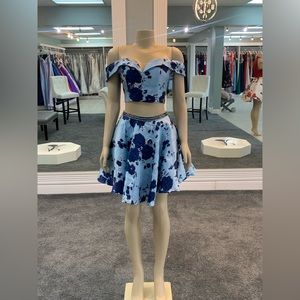 size 4. floral 2 piece. studded belt. capped sleeves. sweetheart neckline